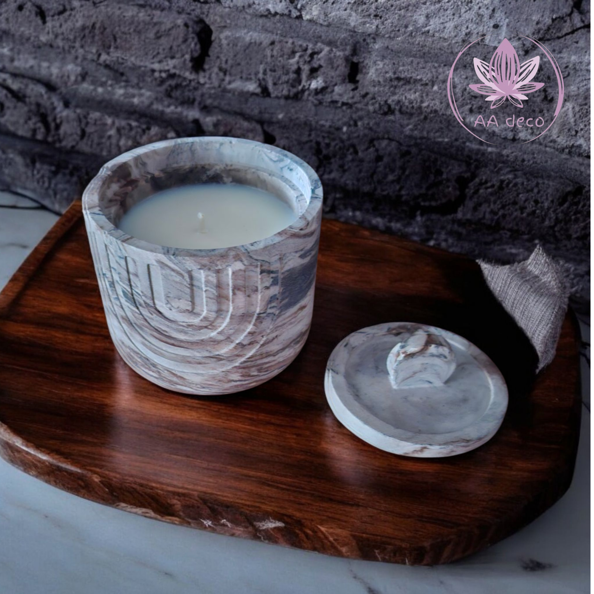 Minimalist handmade candle in gypsum container, sustainable soy wax.