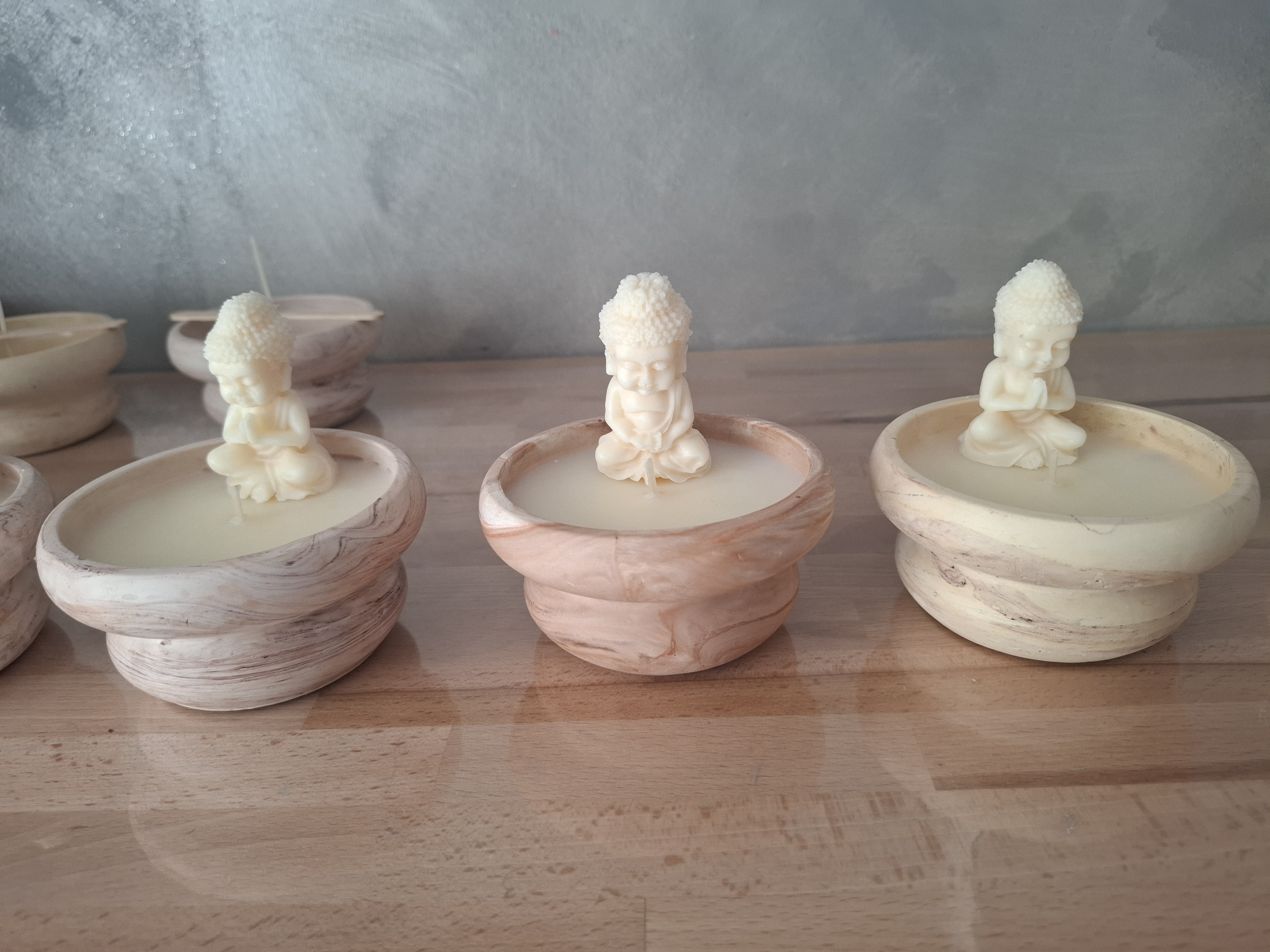 Minimalist handmade candle in gypsum container, sustainable soy wax.