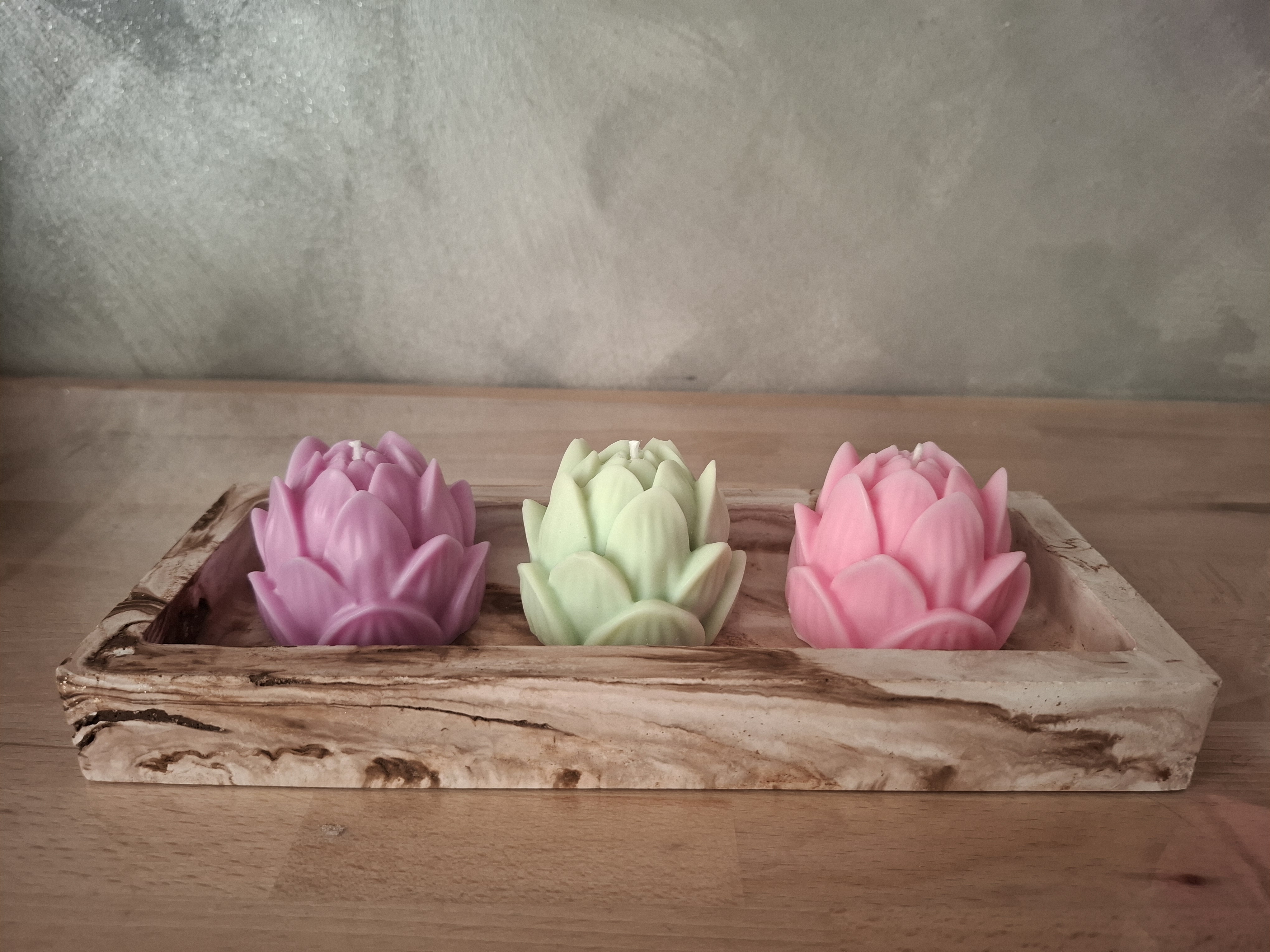 Minimalist handmade candle in gypsum container, sustainable soy wax.