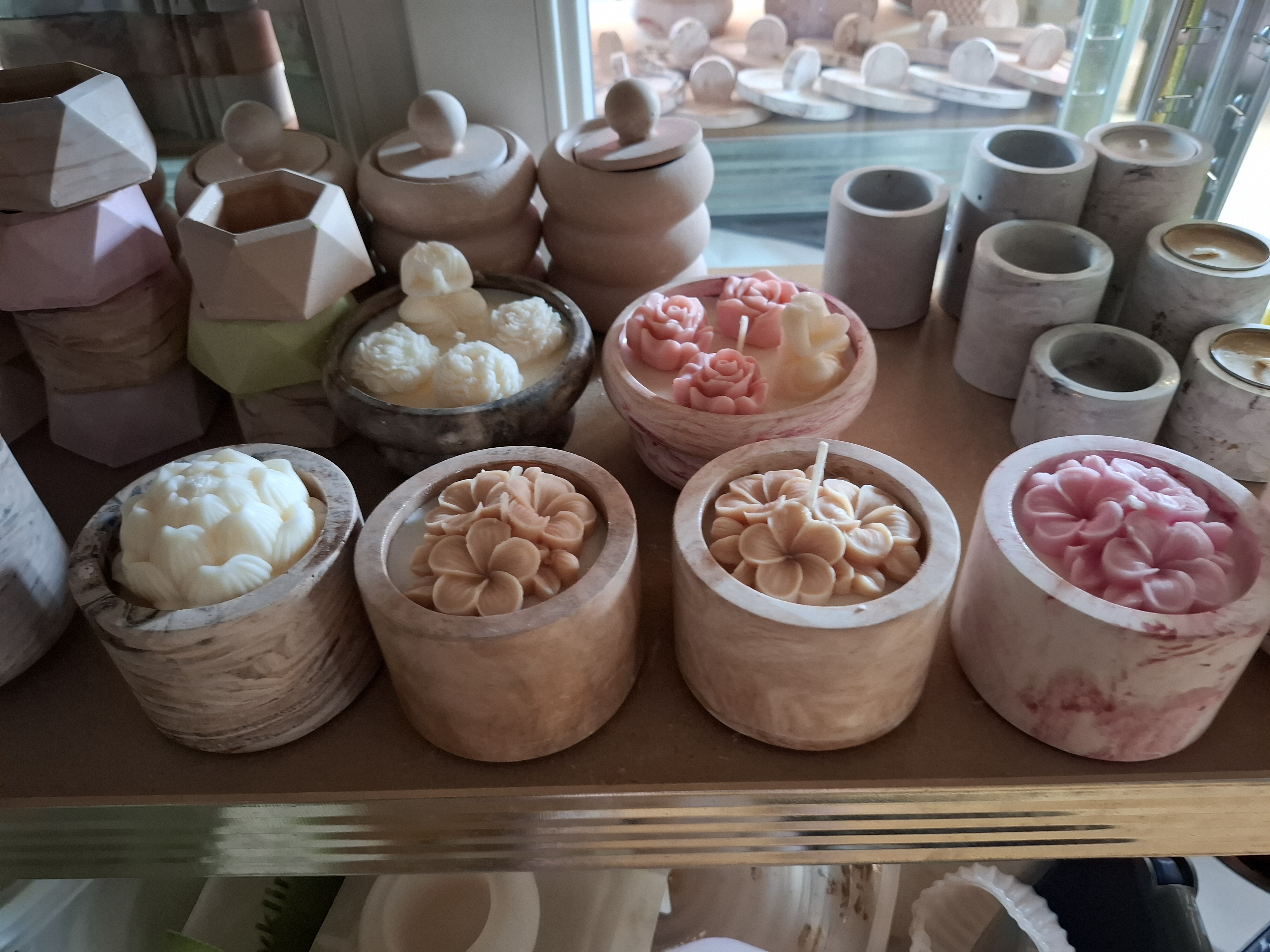 Minimalist handmade candle in gypsum container, sustainable soy wax.