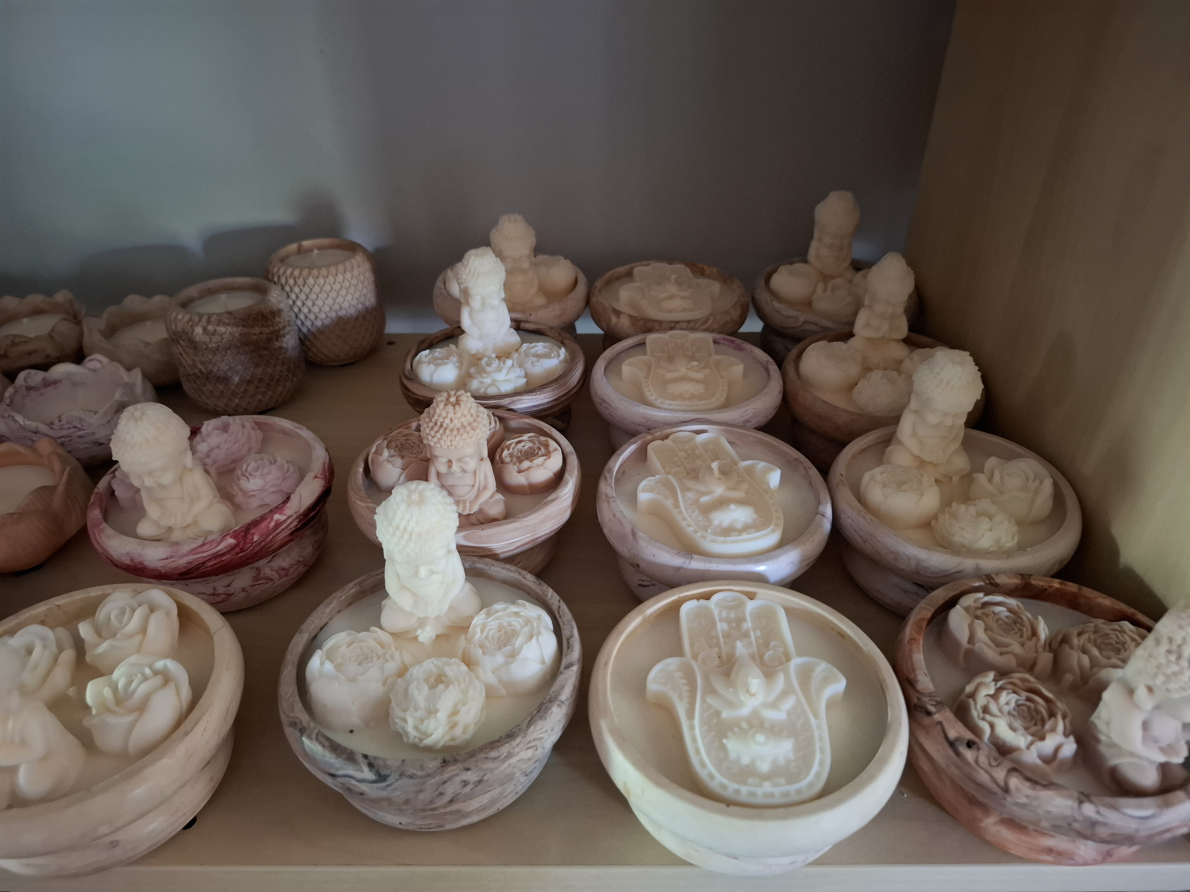 Minimalist handmade candle in gypsum container, sustainable soy wax.