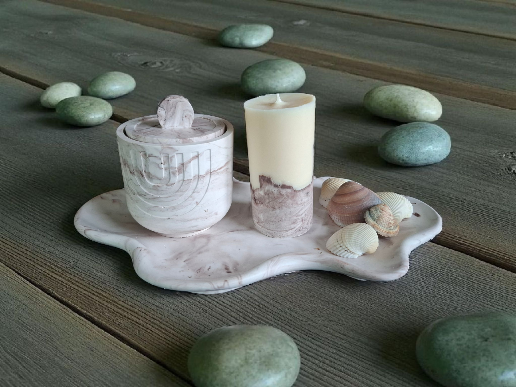 Minimalist handmade candle in gypsum container, sustainable soy wax.