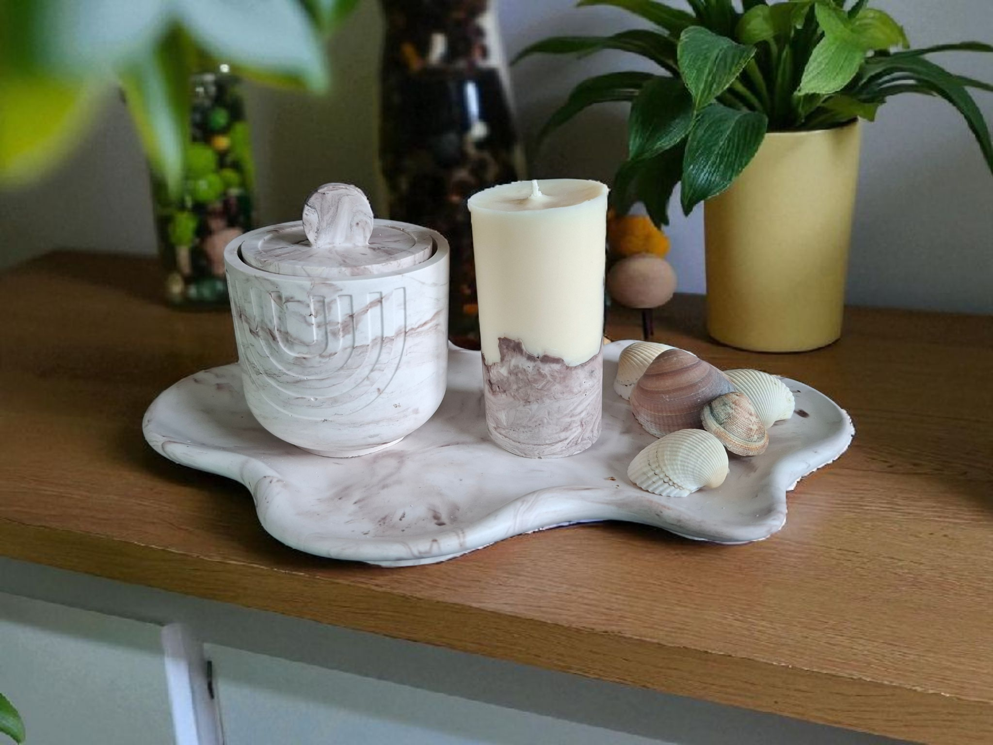 Minimalist handmade candle in gypsum container, sustainable soy wax.