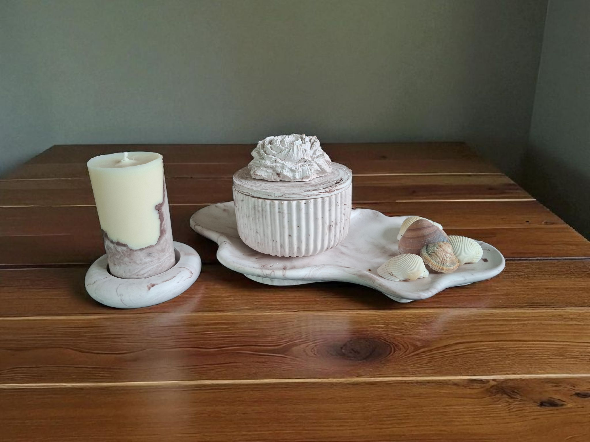 Minimalist handmade candle in gypsum container, sustainable soy wax.