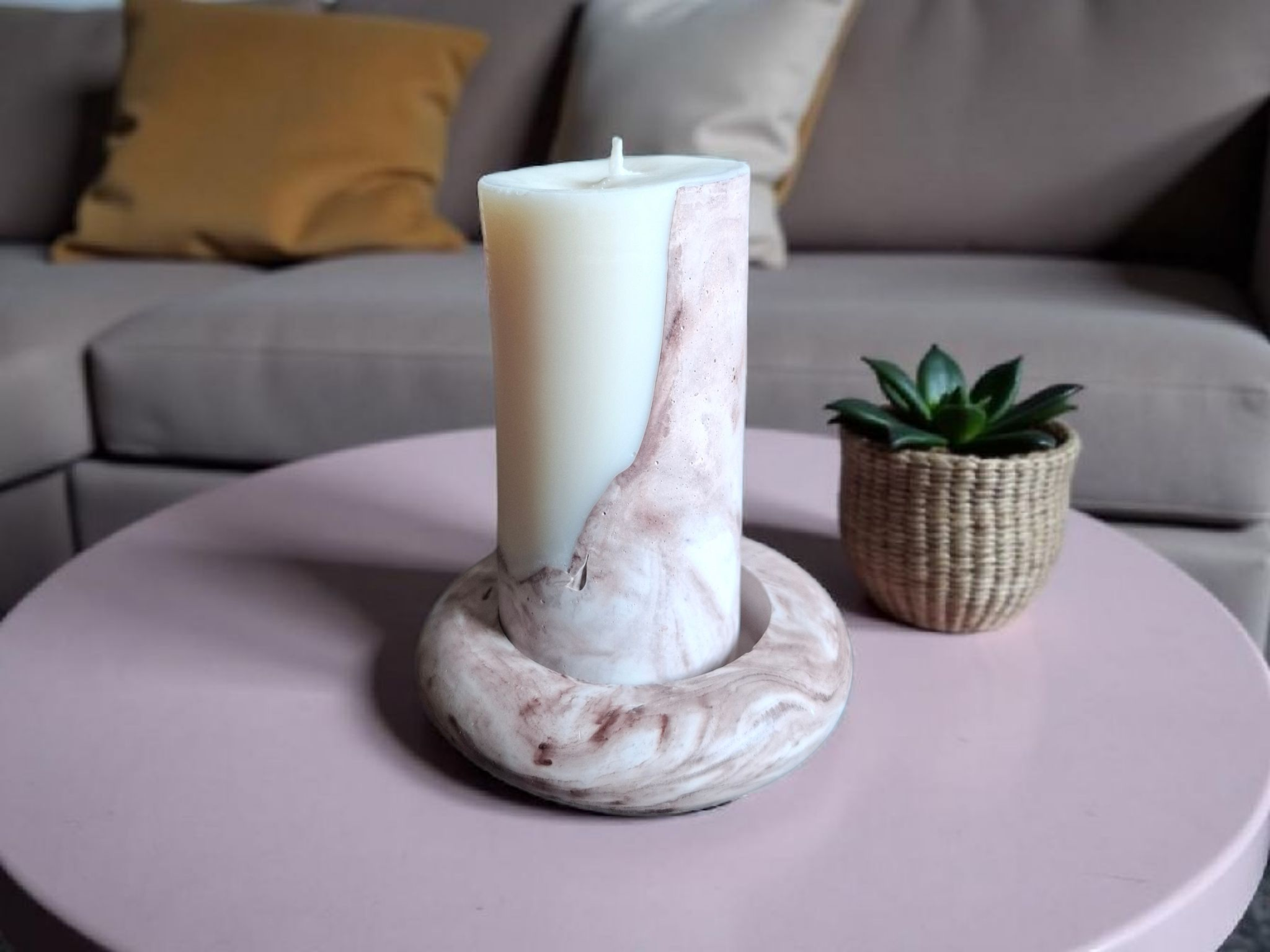 Minimalist handmade candle in gypsum container, sustainable soy wax.