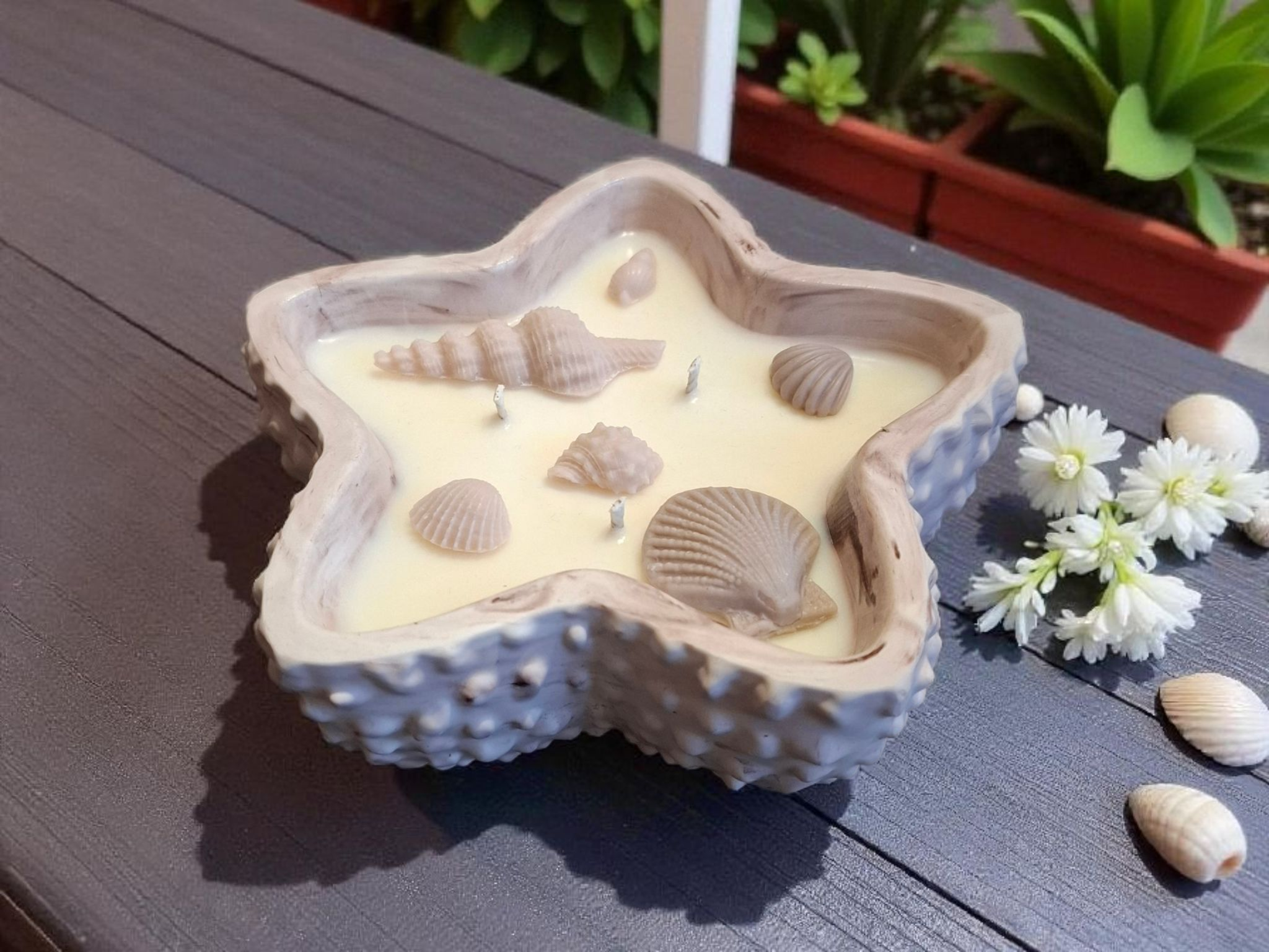 Minimalist handmade candle in gypsum container, sustainable soy wax.